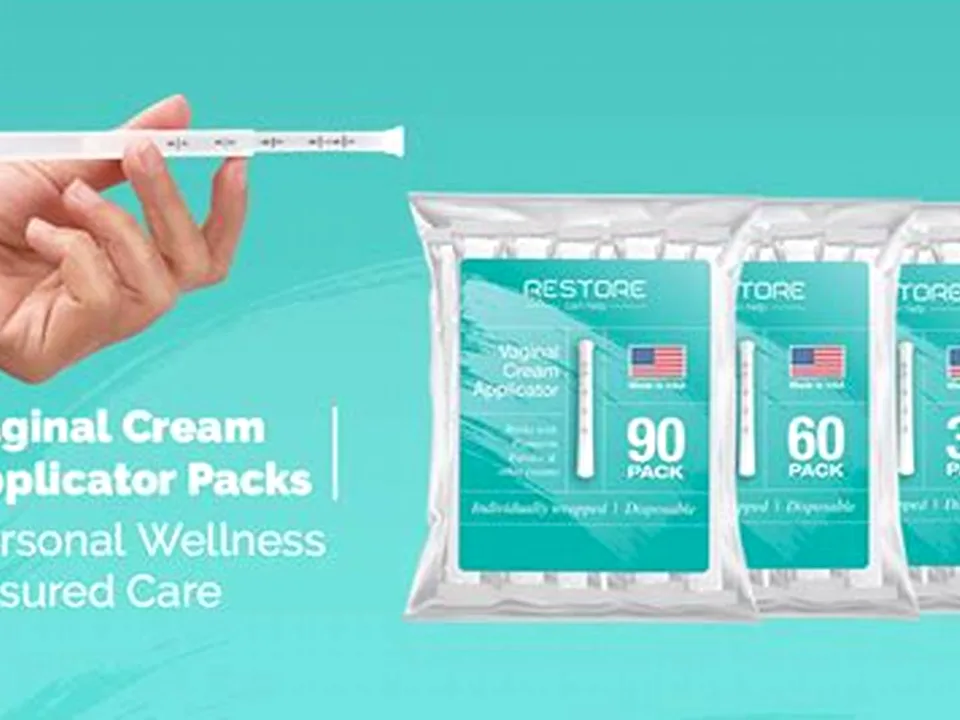 A tube of prescription estradiol vaginal cream on a clean medical background
