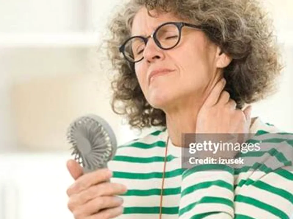A woman researching estradiol side effects, representing women evaluating hormone therapy options